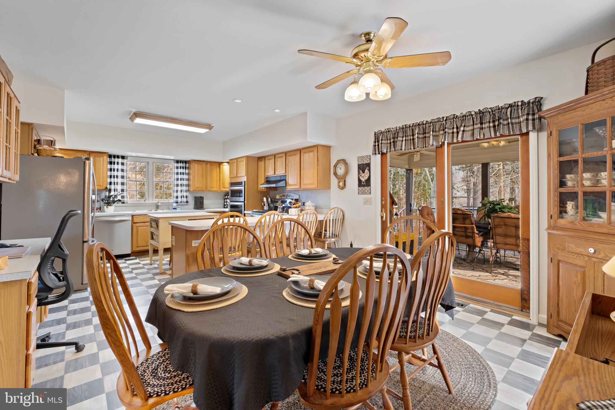 3421 Allen Road Eden, MD 21822 - Photo 21 of 56 a view of a dining room with furniture a chandelier and wooden floor
