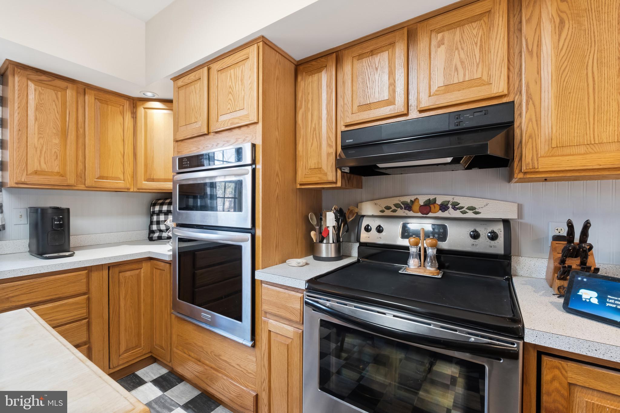 3421 Allen Road Eden, MD 21822 - Photo 24 of 56 a kitchen with stainless steel appliances granite countertop a stove microwave and cabinets