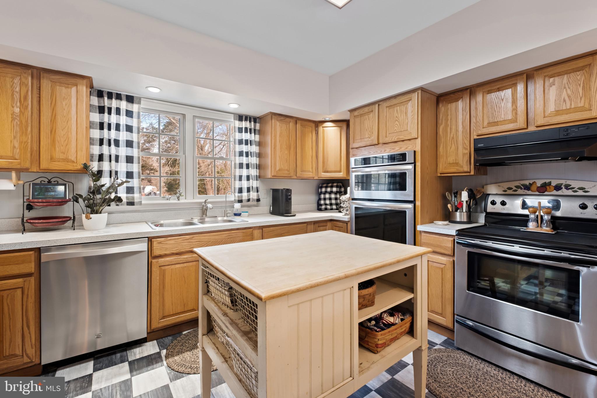 3421 Allen Road Eden, MD 21822 - Photo 25 of 56 a kitchen with a stove a sink and a microwave