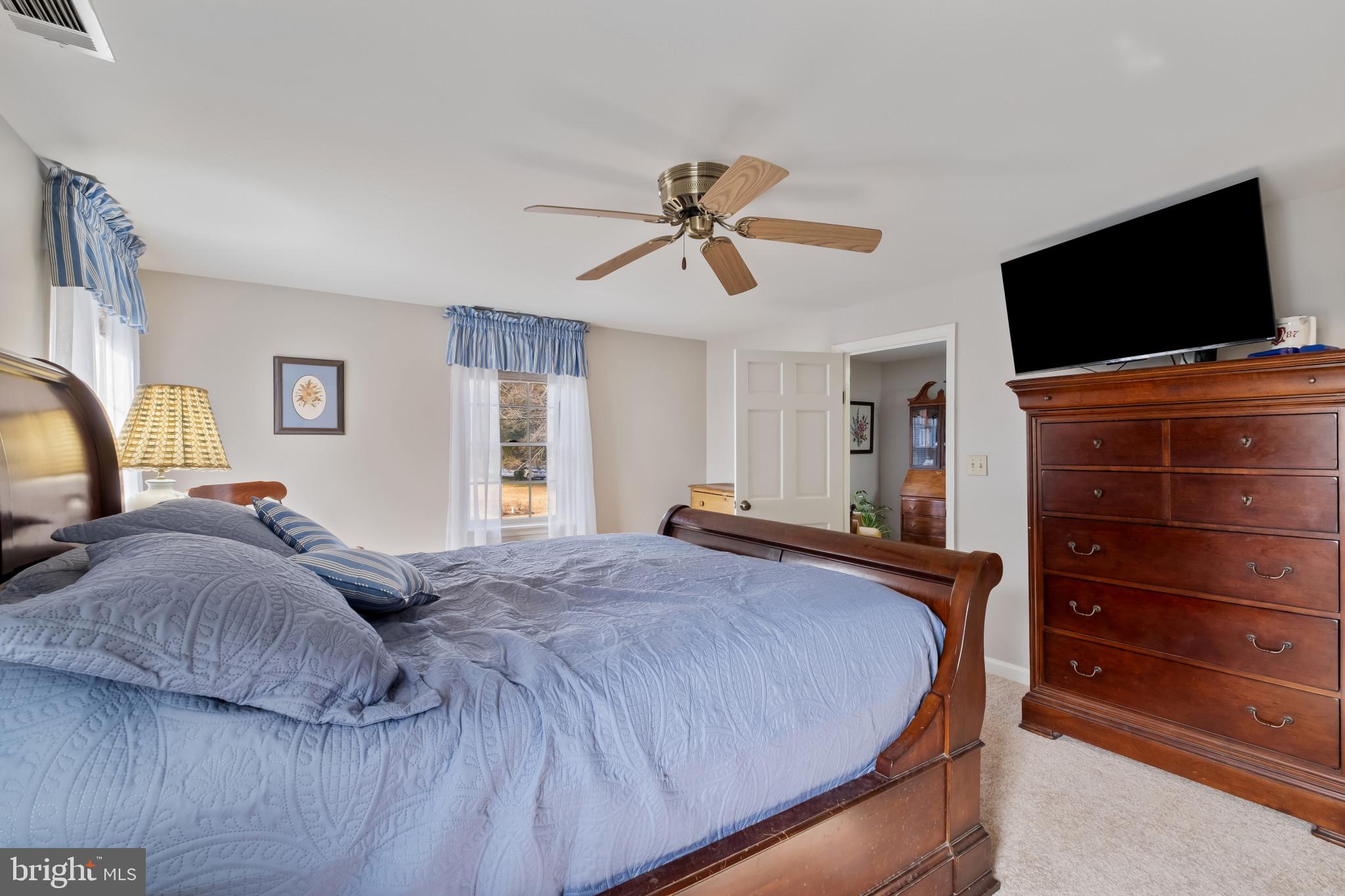 3421 Allen Road Eden, MD 21822 - Photo 30 of 56 a bedroom with a bed and a flat screen tv