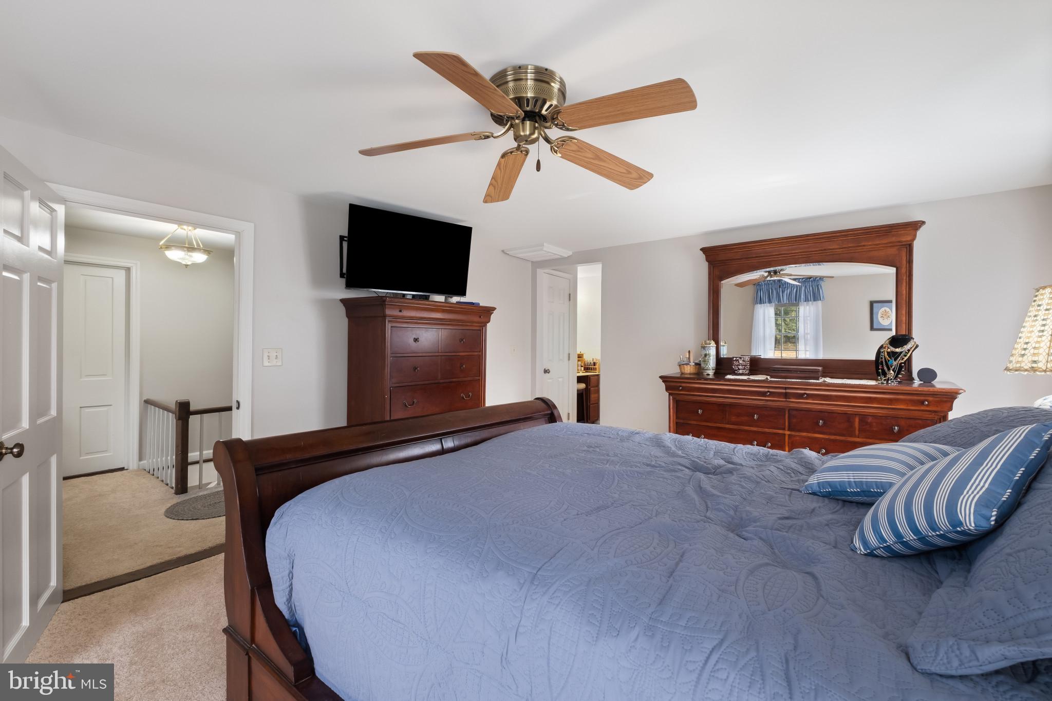 3421 Allen Road Eden, MD 21822 - Photo 32 of 56 a bedroom with a bed and a flat screen tv