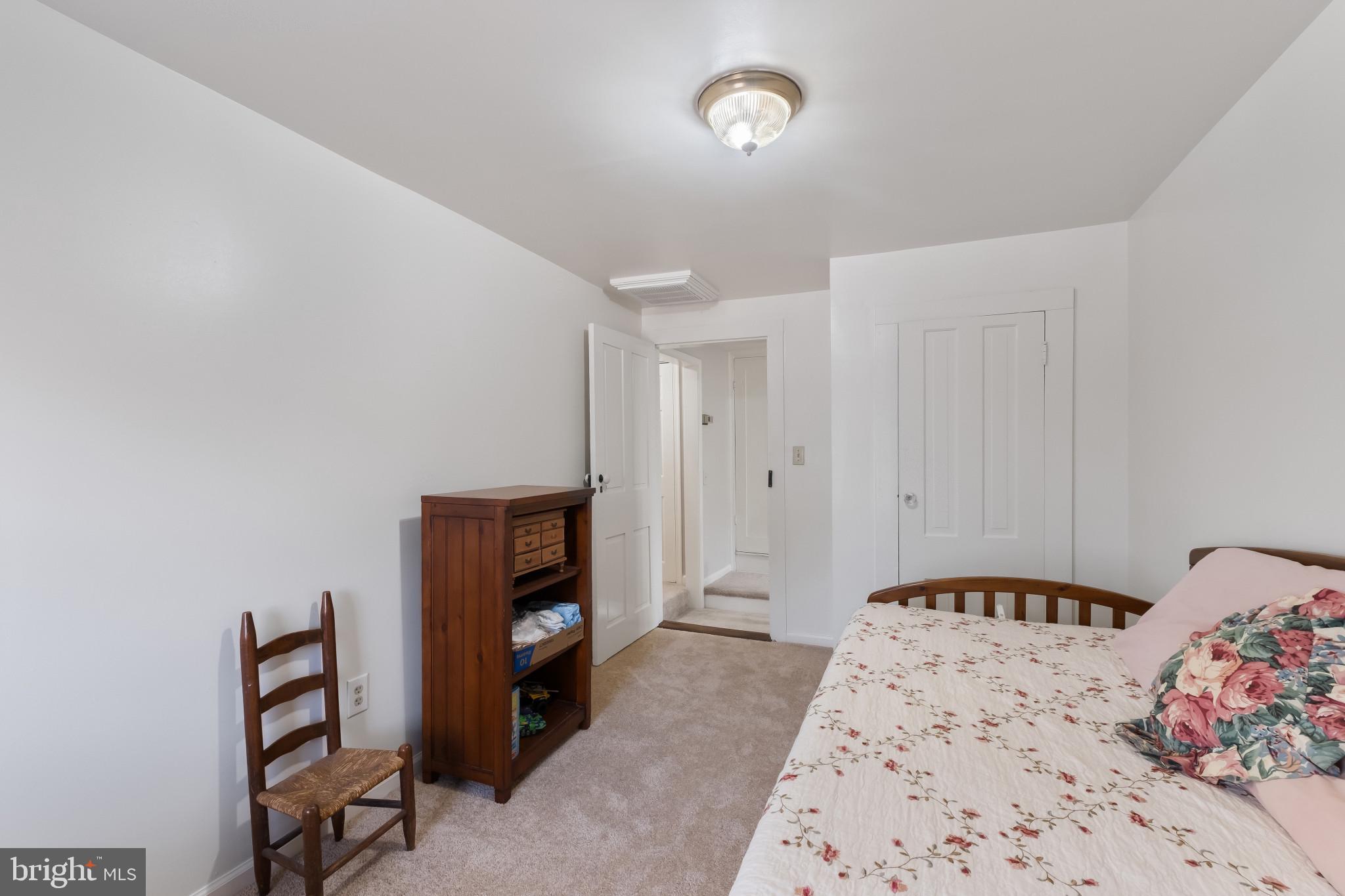 3421 Allen Road Eden, MD 21822 - Photo 37 of 56 a bedroom with a bed and a table in it