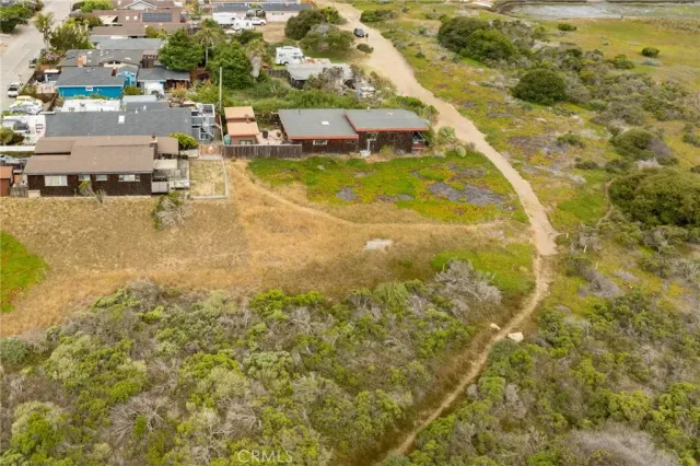 a aerial view of residential houses with outdoor space
