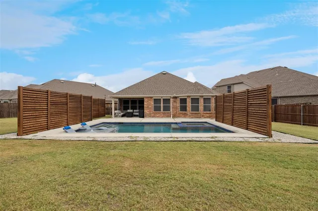 a view of a house with a swimming pool
