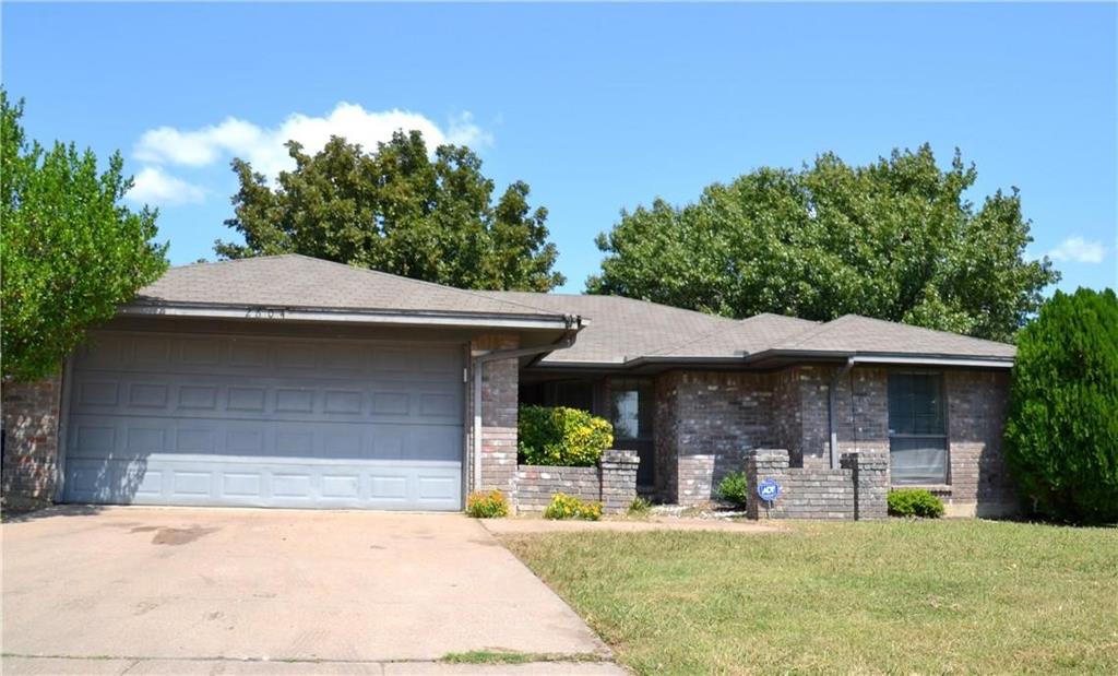 2604 Ridge Road North Fort Worth, TX 76133 - Photo 1 of 1 a front view of a house with garden