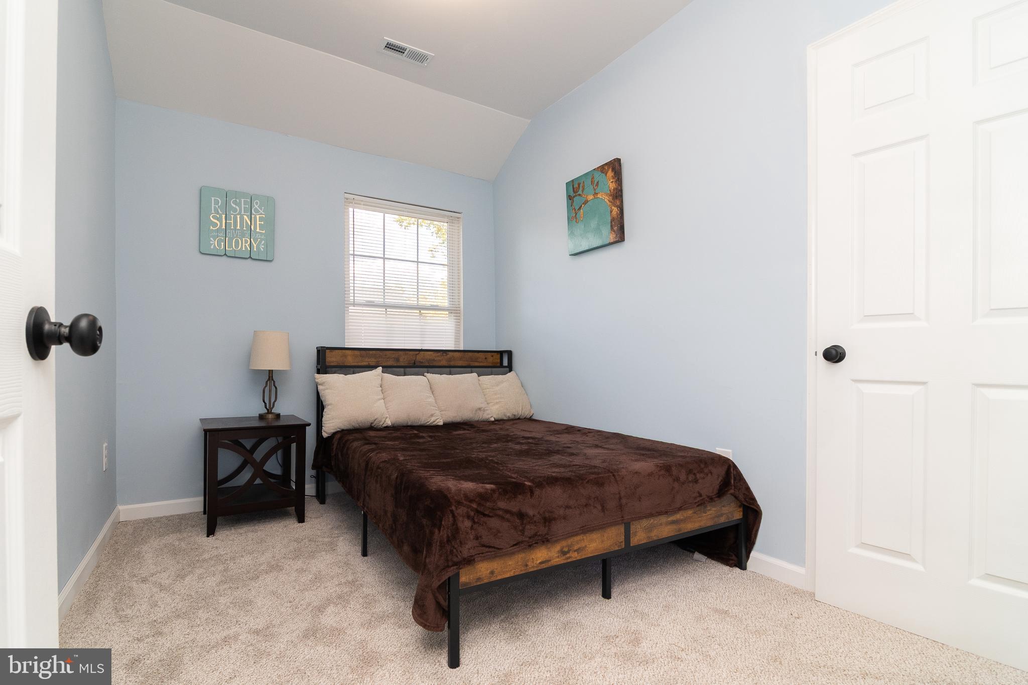 1154 West 6th Street Laurel, DE 19956 - Photo 12 of 27 a bedroom with a bed and a window