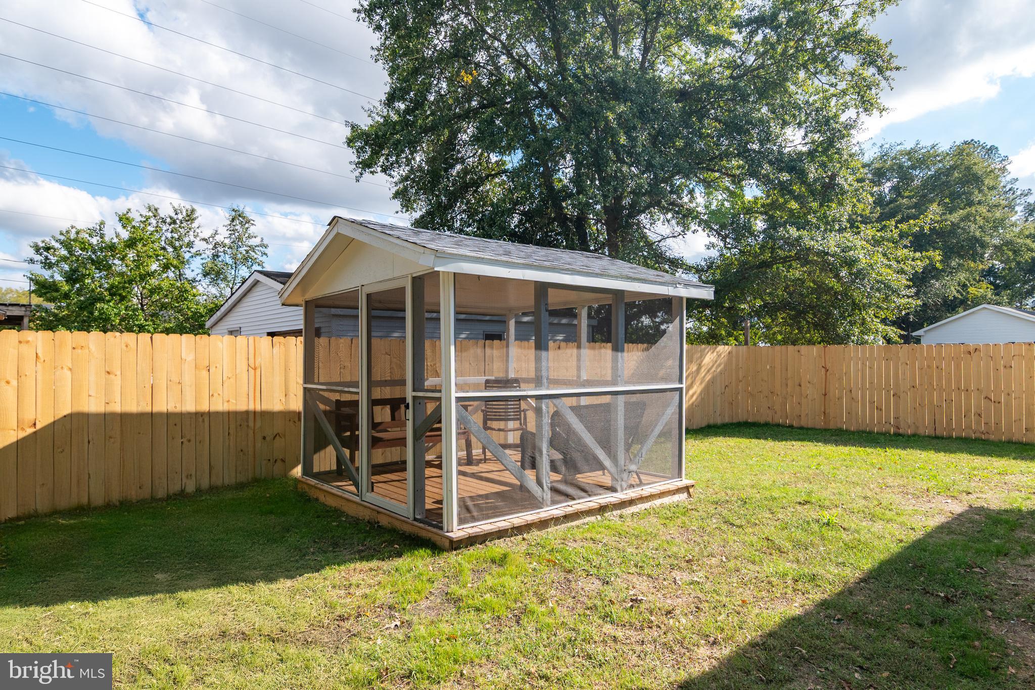 1154 West 6th Street Laurel, DE 19956 - Photo 21 of 27 a view of backyard with deck and seating space