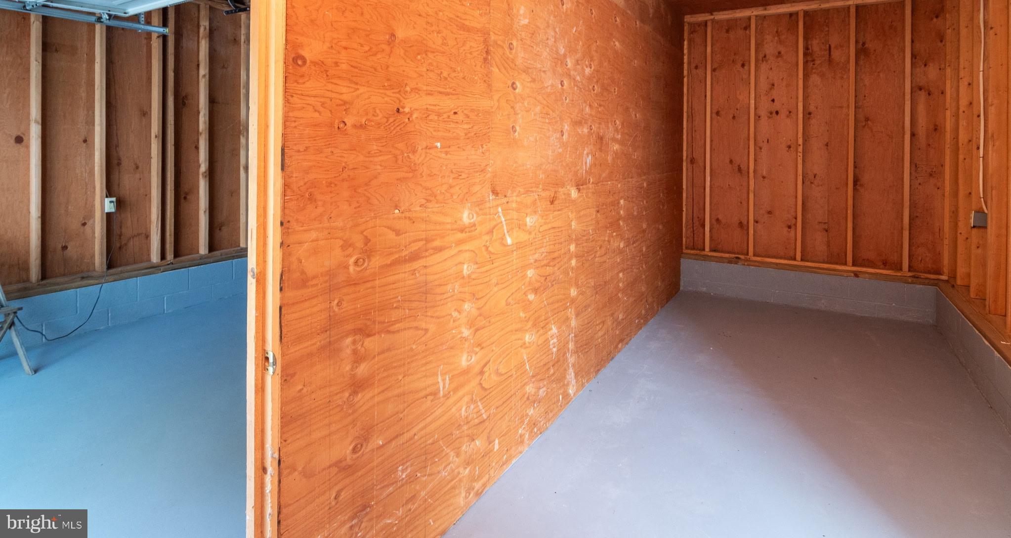 1154 West 6th Street Laurel, DE 19956 - Photo 27 of 27 a view of a hallway with wooden walls
