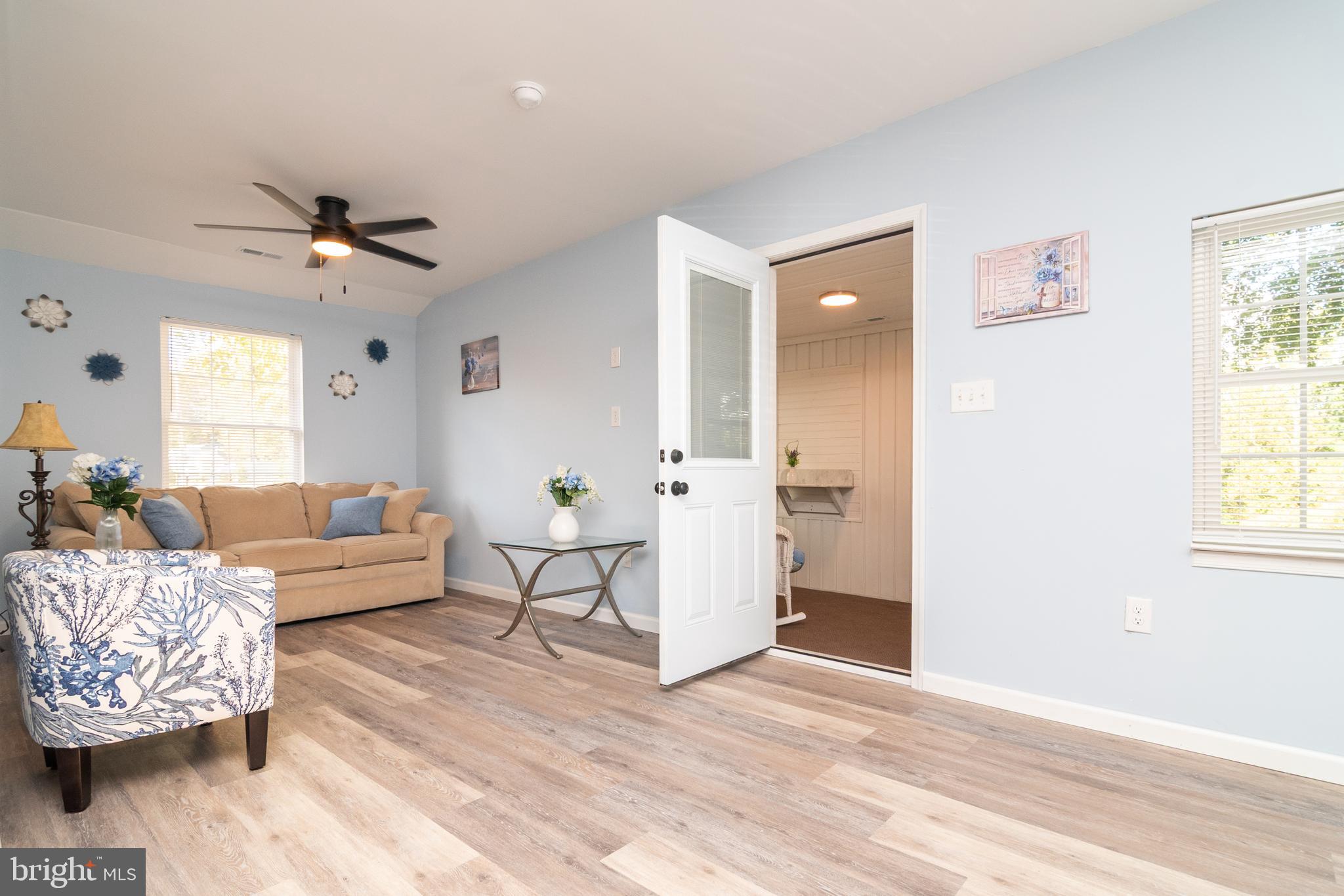 1154 West 6th Street Laurel, DE 19956 - Photo 3 of 27 a living room with furniture and a large window
