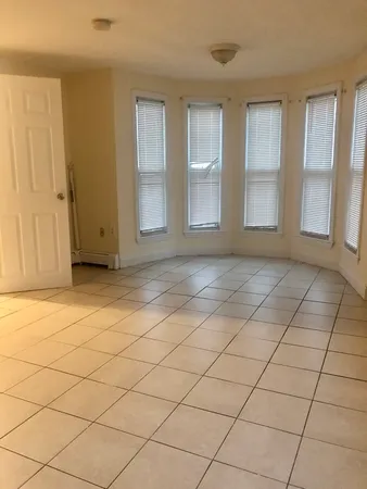 a view of a livingroom with wooden floor
