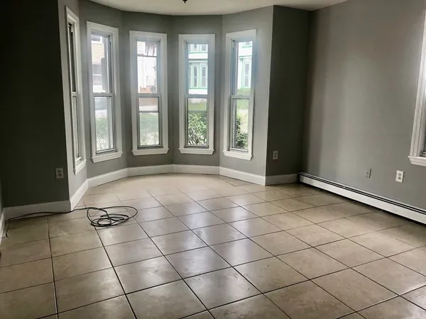 a view of a livingroom with windows