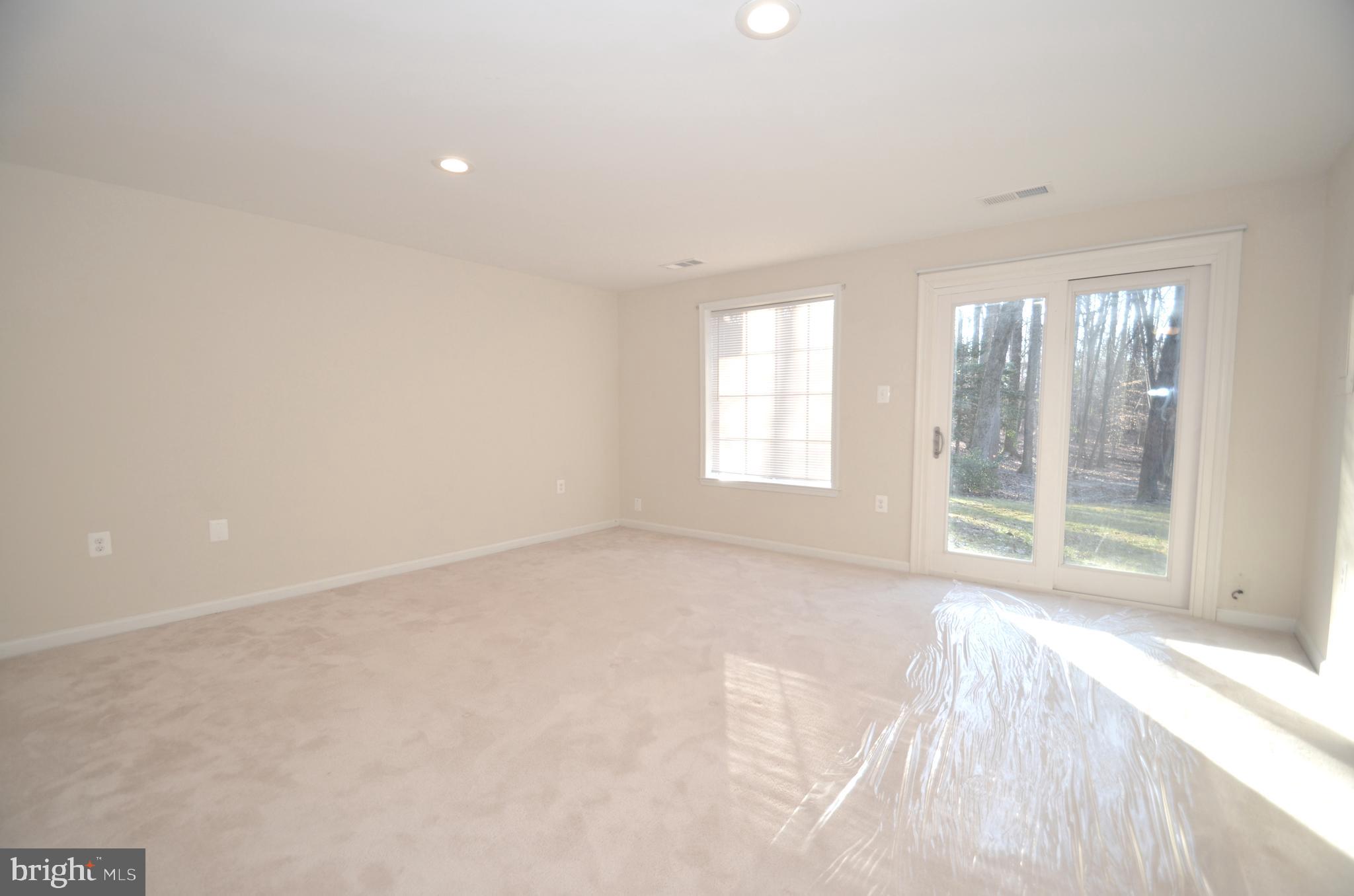 7915 Gambrill Court Springfield, VA 22153 - Photo 19 of 25 Rec Room w/ New Patio Slider
