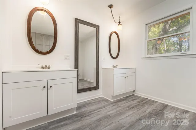 a bathroom with a bathtub and toilet
