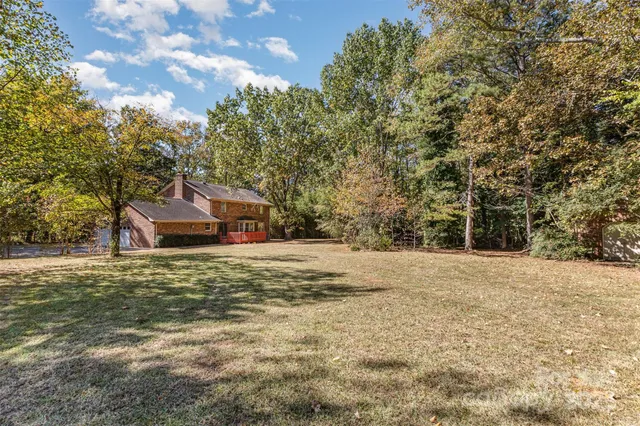 a house with trees in front of it