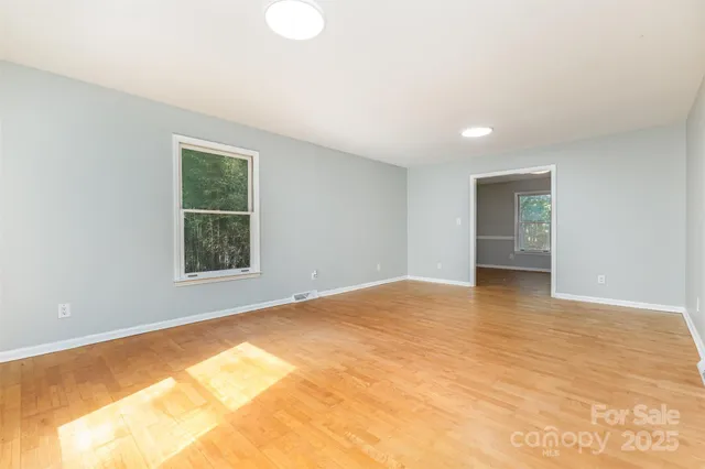 an empty room with windows