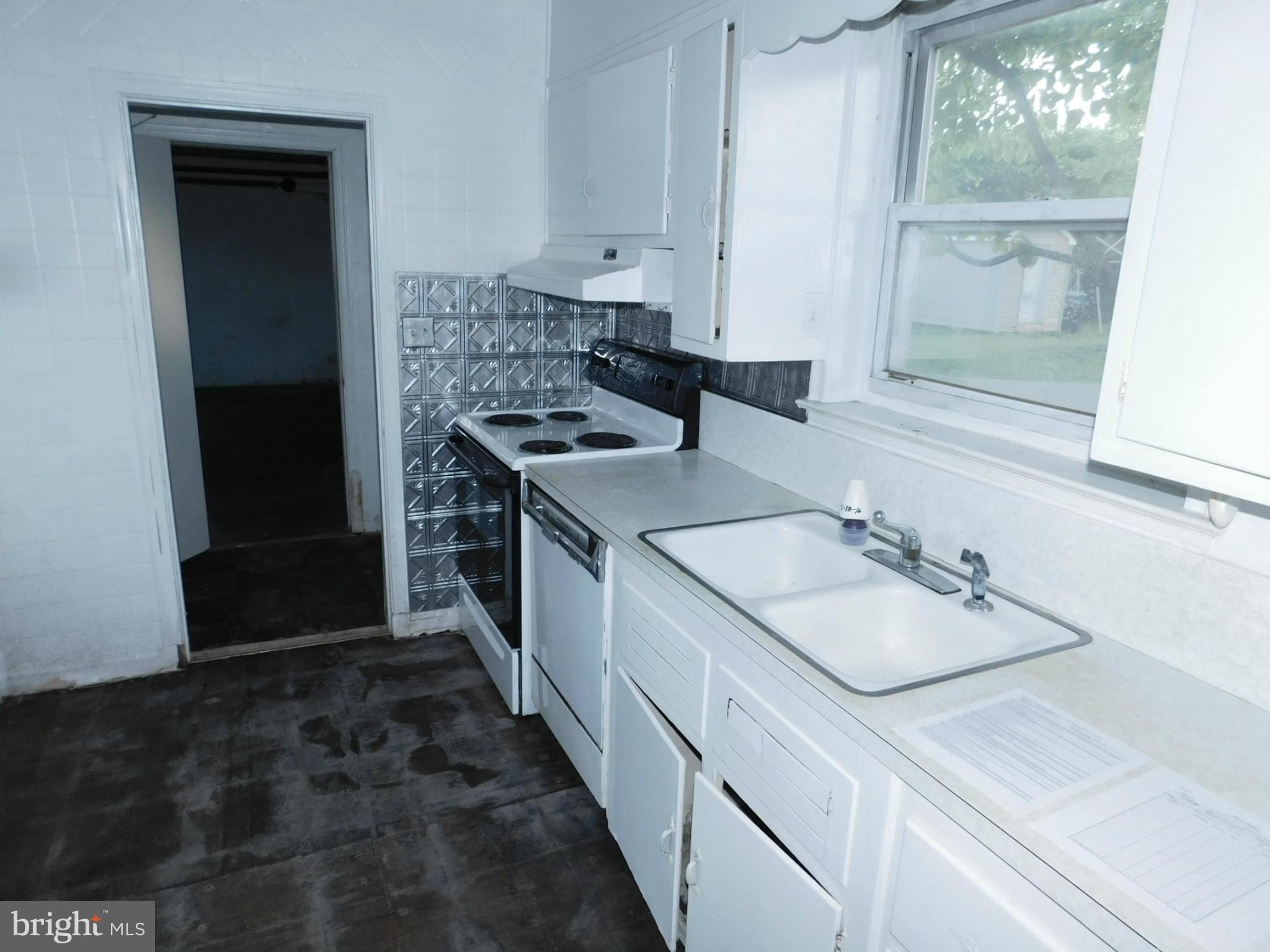 8401 Liberty Road Baltimore, MD 21244 - Photo 17 of 28 a bathroom with a sink and a mirror
