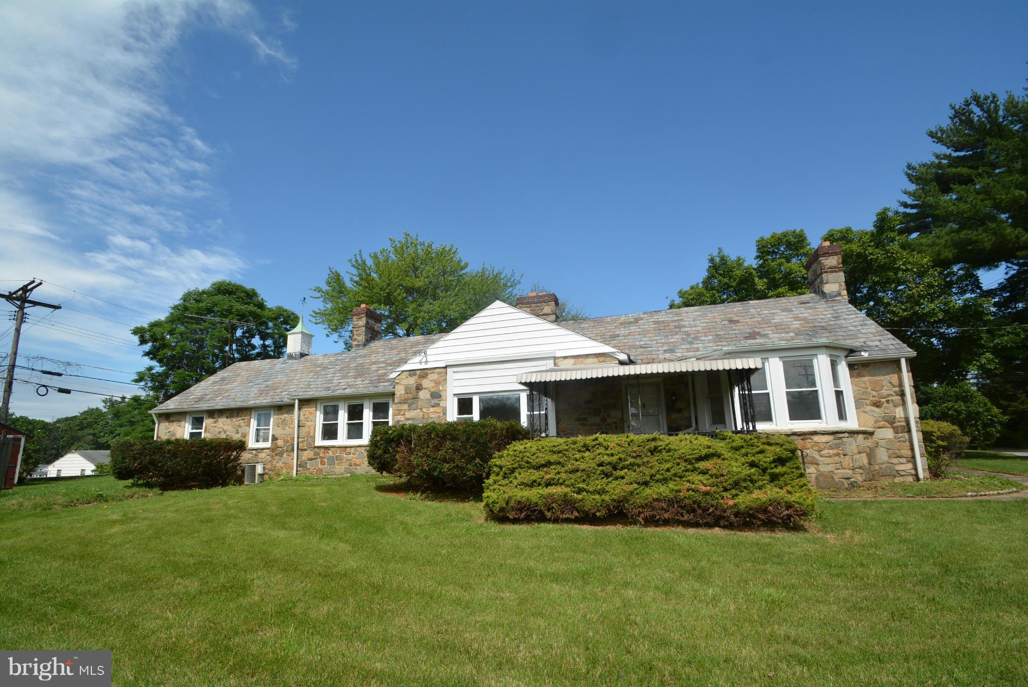 8401 Liberty Road Baltimore, MD 21244 - Photo 3 of 28 a front view of a house with a yard