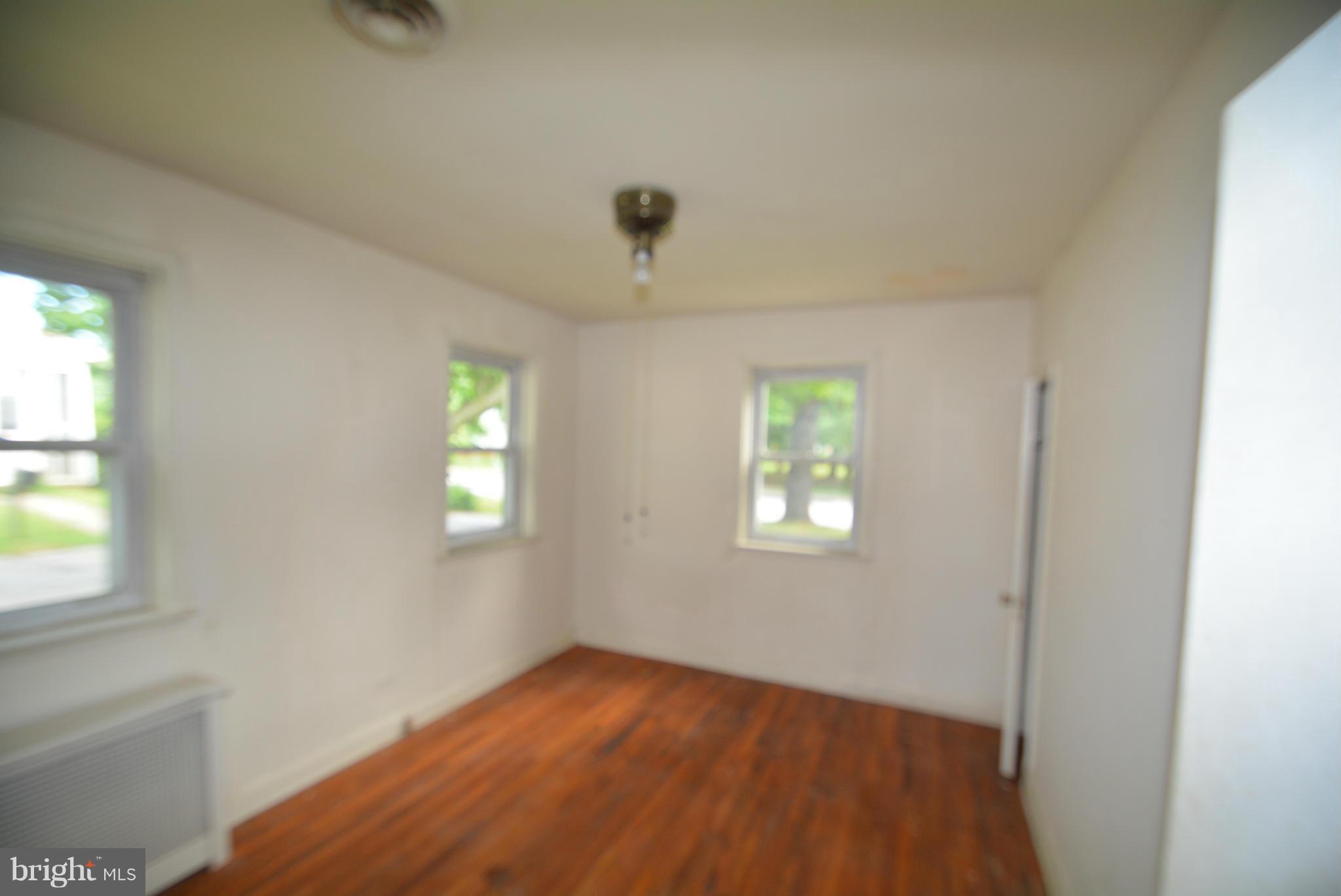 8401 Liberty Road Baltimore, MD 21244 - Photo 4 of 28 a view of an empty room with a window