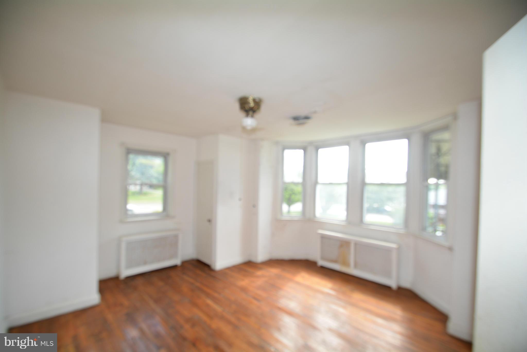 8401 Liberty Road Baltimore, MD 21244 - Photo 9 of 28 an empty room with windows
