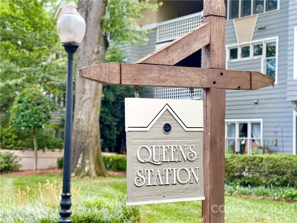 308 Queens Road, Unit 23 Charlotte, NC 28204 - Photo 22 of 22 a sign on the side of a building