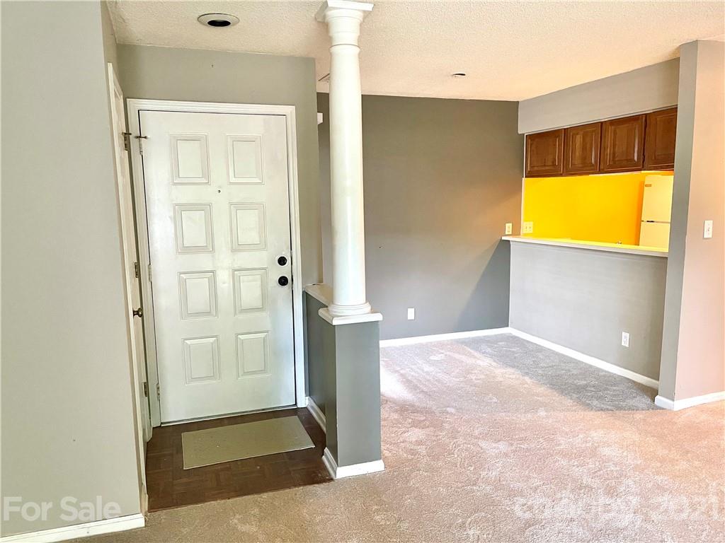 308 Queens Road, Unit 23 Charlotte, NC 28204 - Photo 5 of 22 a view of entryway with a door