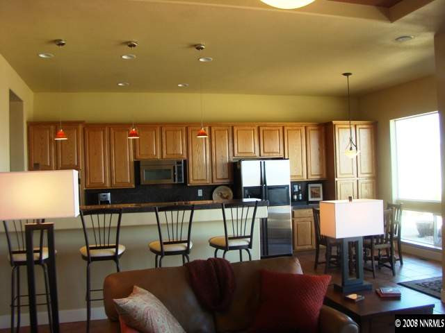 523 Echo Ridge Court Reno, NV 89511 - Photo 2 of 9 a view of a dining room with furniture window and outside view