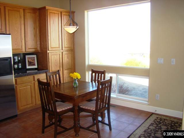 523 Echo Ridge Court Reno, NV 89511 - Photo 5 of 9 a dining room with furniture and window