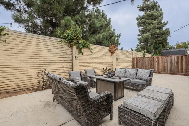 a view of a patio on the deck front of house