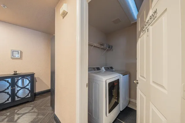 a utility room with dryer and washer