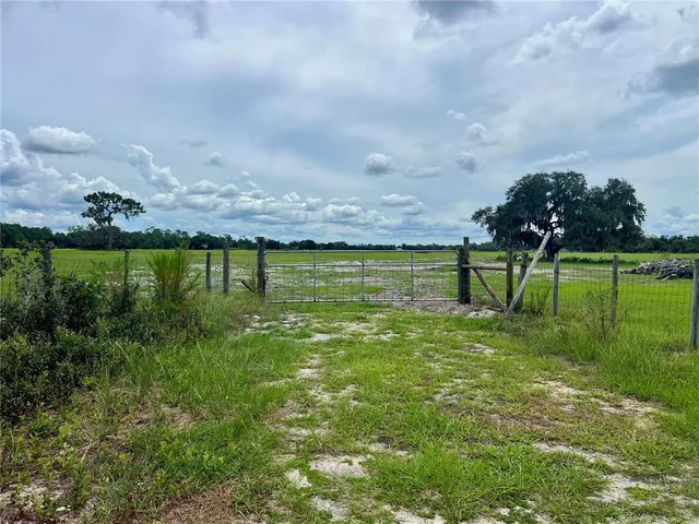 a view of a lake with a big yard