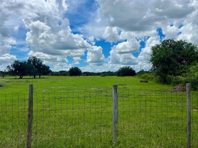 a view of a golf course with a garden
