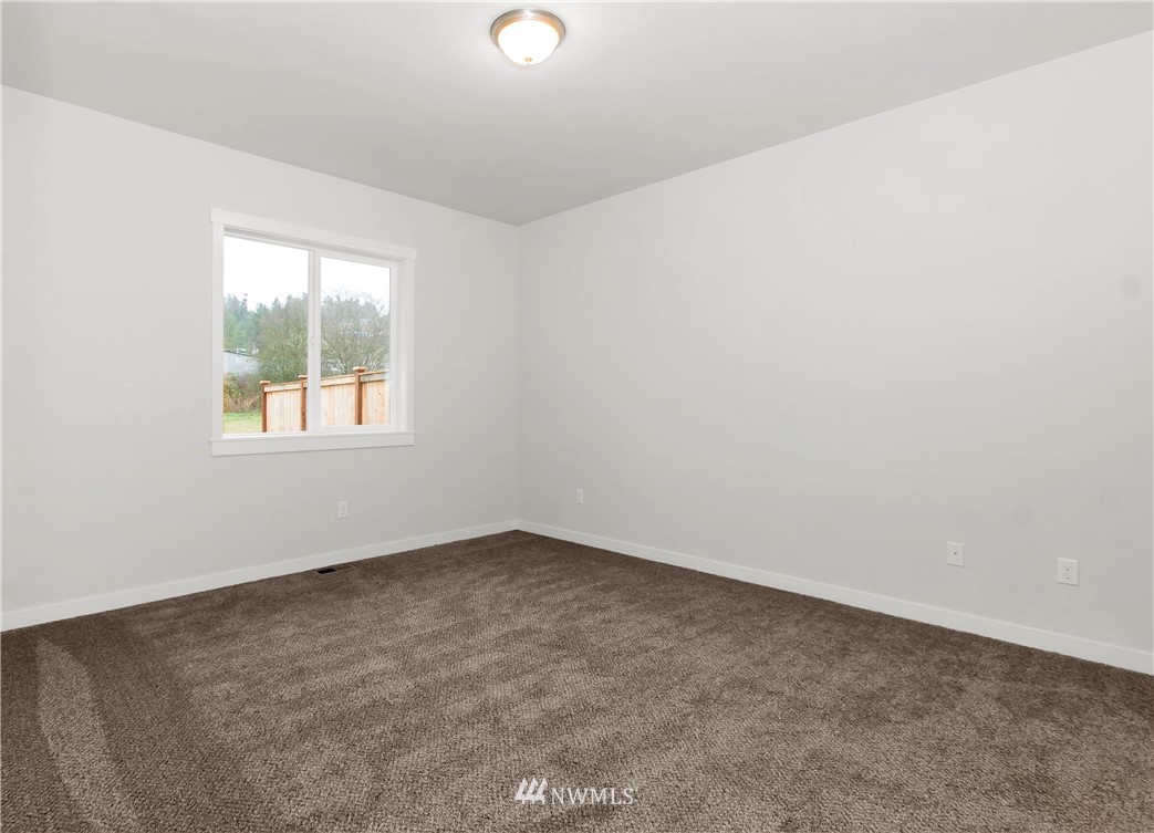 674 Southwest 20th Street Chehalis, WA 98532 - Photo 16 of 29 an empty room with a window