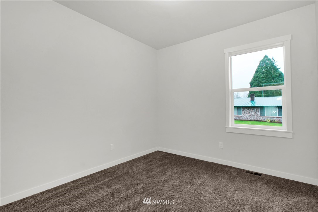 674 Southwest 20th Street Chehalis, WA 98532 - Photo 27 of 29 an empty room with a window