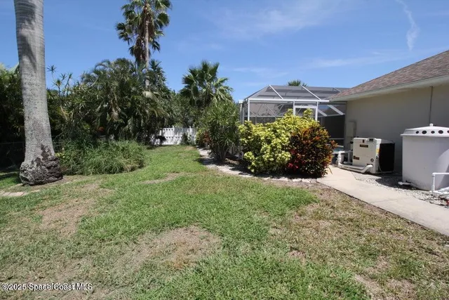 a view of a garden with a chair