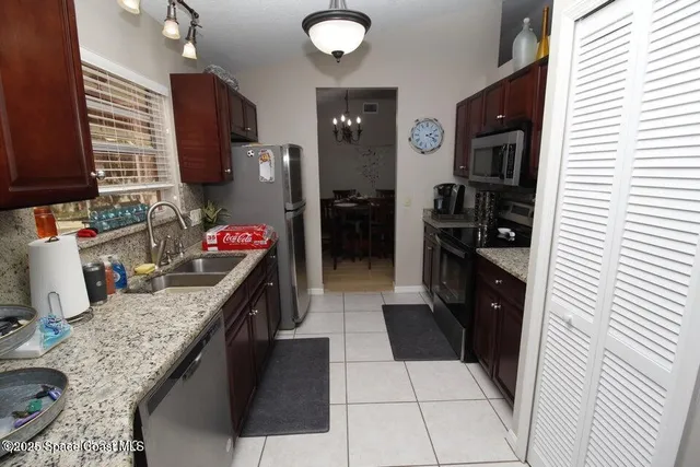 a kitchen with granite countertop lots of counter top space