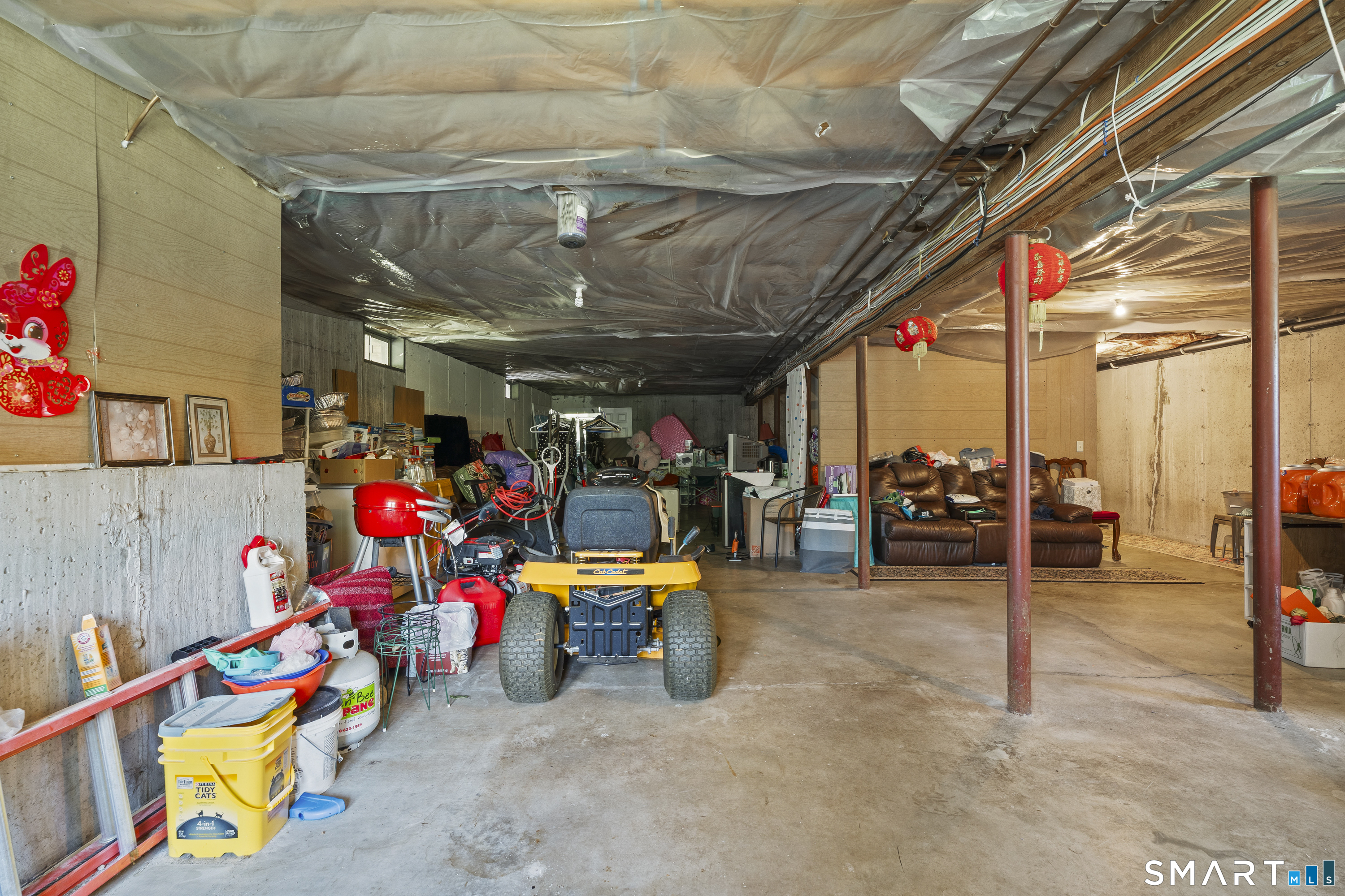 52 Middle Road Preston, CT 06365 - Photo 35 of 39 a view of a garage with a table and chairs