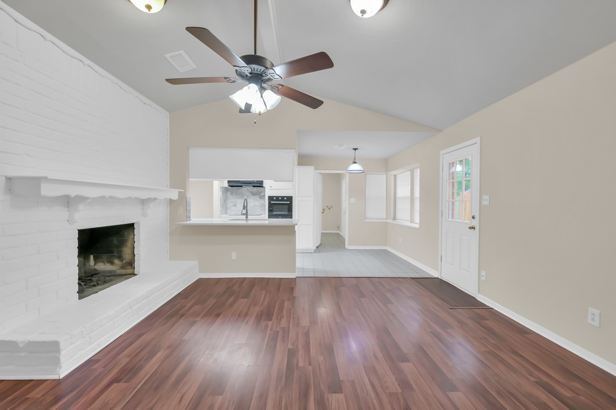 29610 Loddington Street Spring, TX 77386 - Photo 40 of 40 a view of an empty room with a fireplace and a window