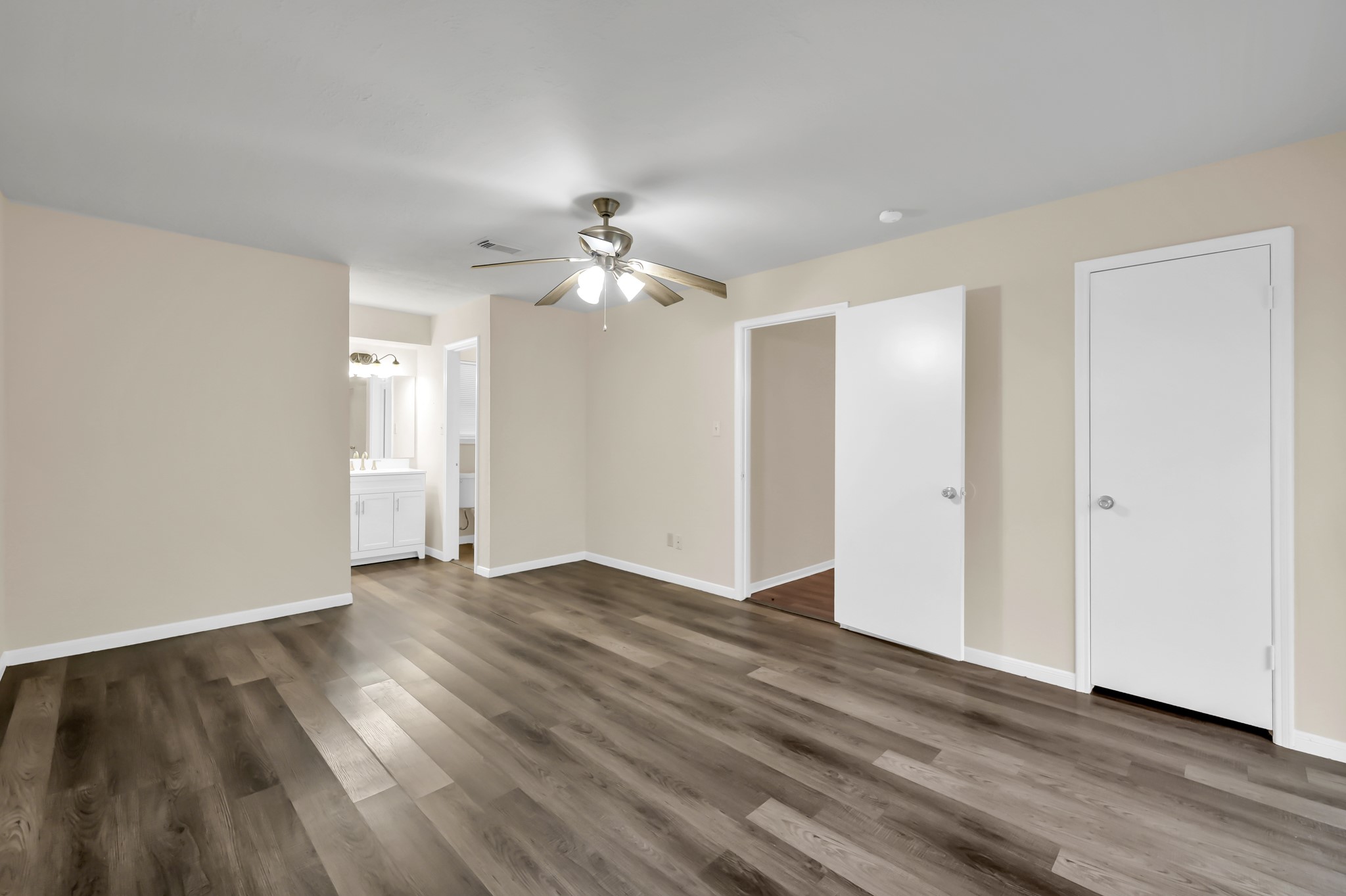 29610 Loddington Street Spring, TX 77386 - Photo 23 of 40 a view of an empty room with wooden floor