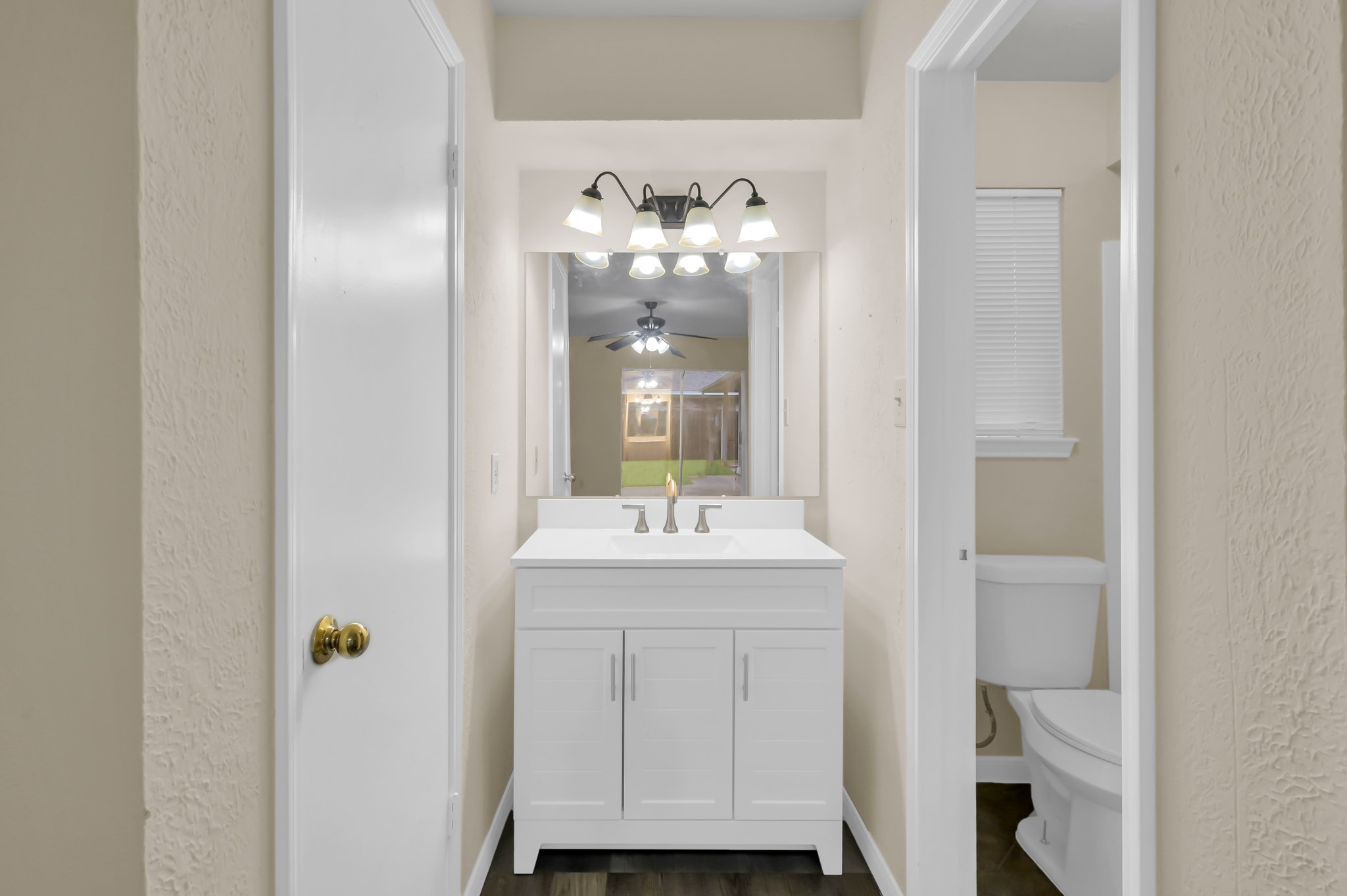 29610 Loddington Street Spring, TX 77386 - Photo 26 of 40 a bathroom with a sink and mirror