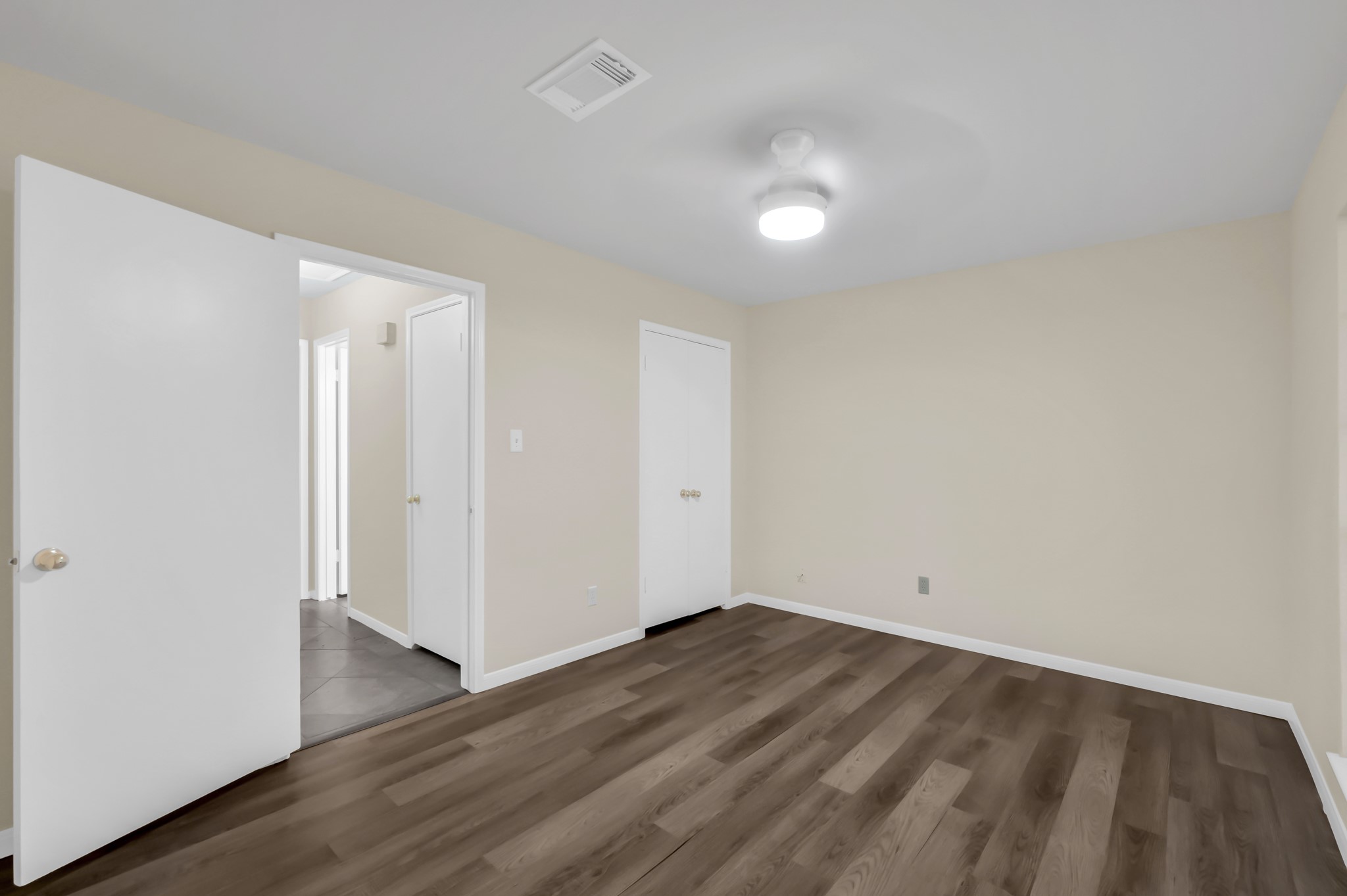 29610 Loddington Street Spring, TX 77386 - Photo 29 of 40 an empty room with wooden floor