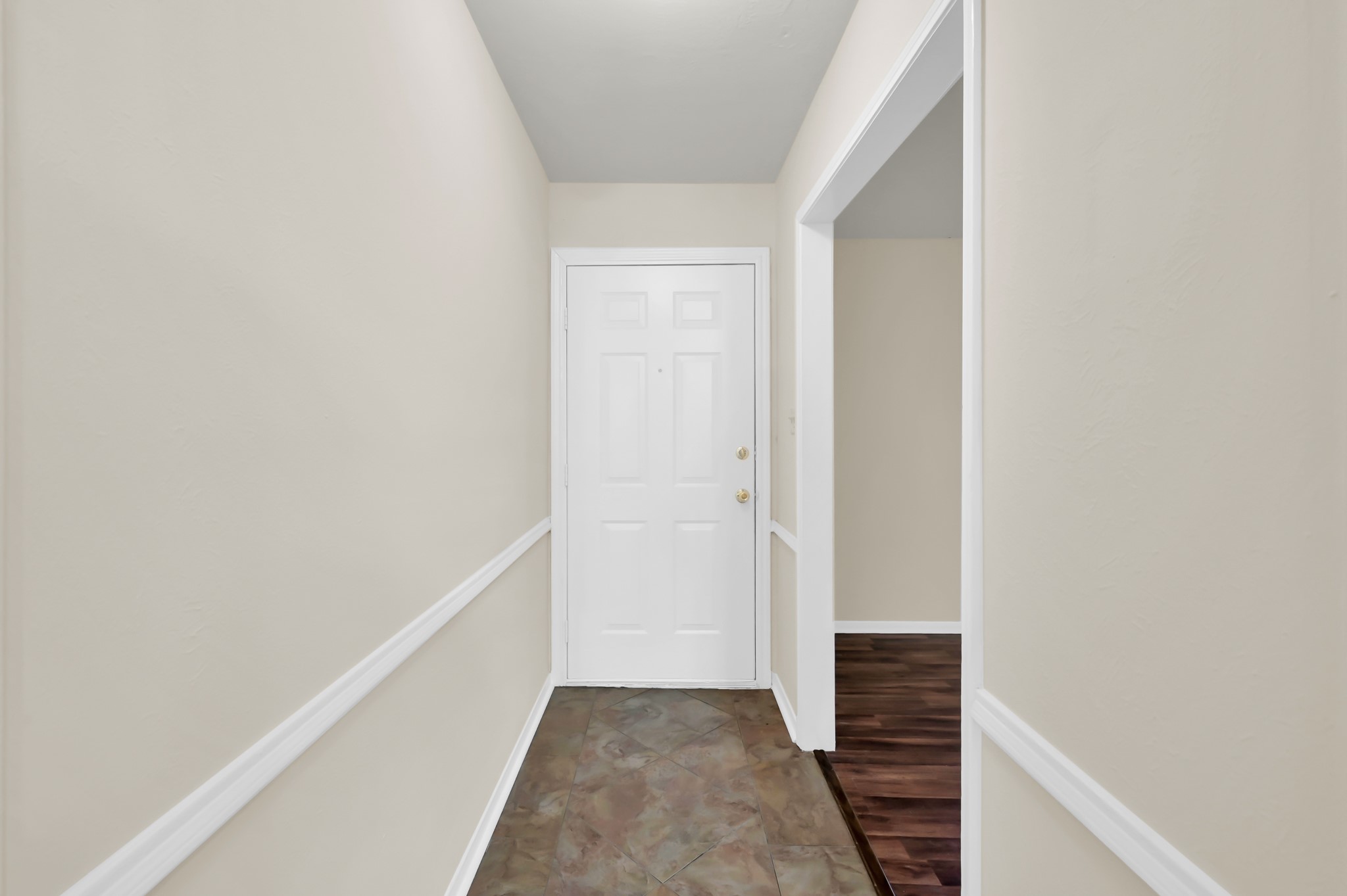 29610 Loddington Street Spring, TX 77386 - Photo 8 of 40 a view of hallway with closet and wooden floor