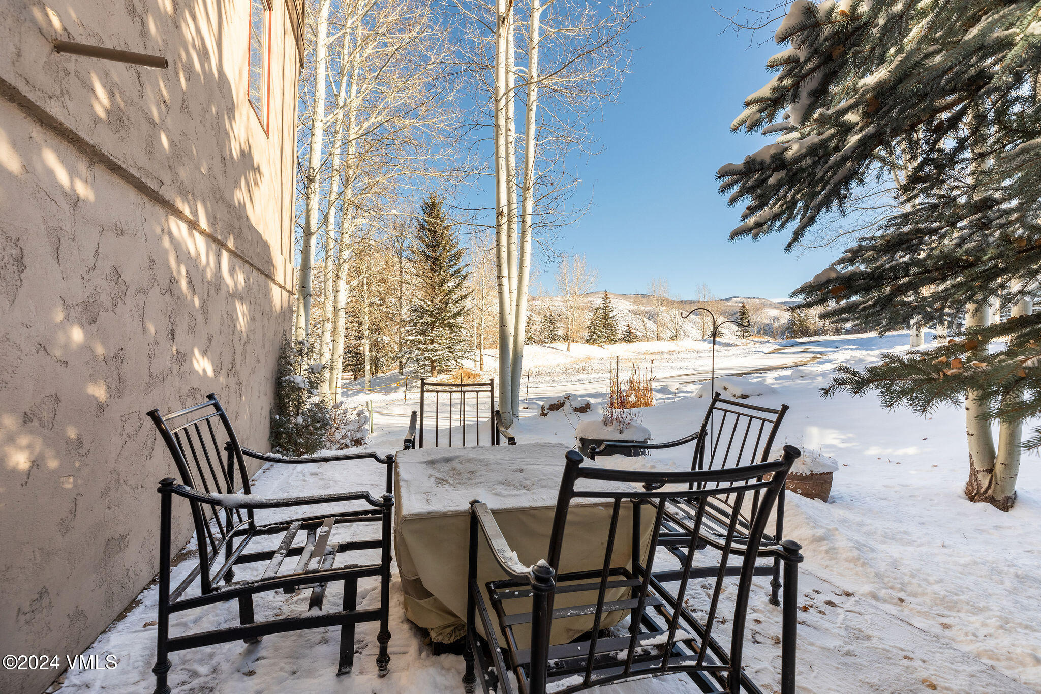 42 Knudson Ranch Road Edwards, CO 81632 - Photo 11 of 22 a view of a outdoor space with chairs and tables