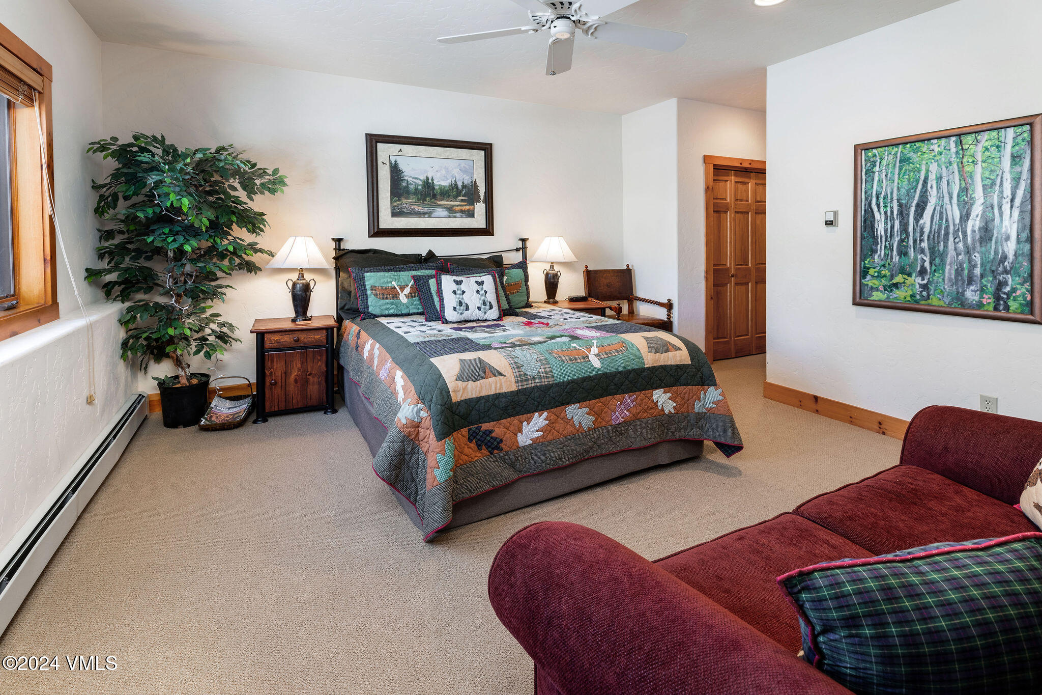 42 Knudson Ranch Road Edwards, CO 81632 - Photo 17 of 22 a bedroom with a bed couch and window