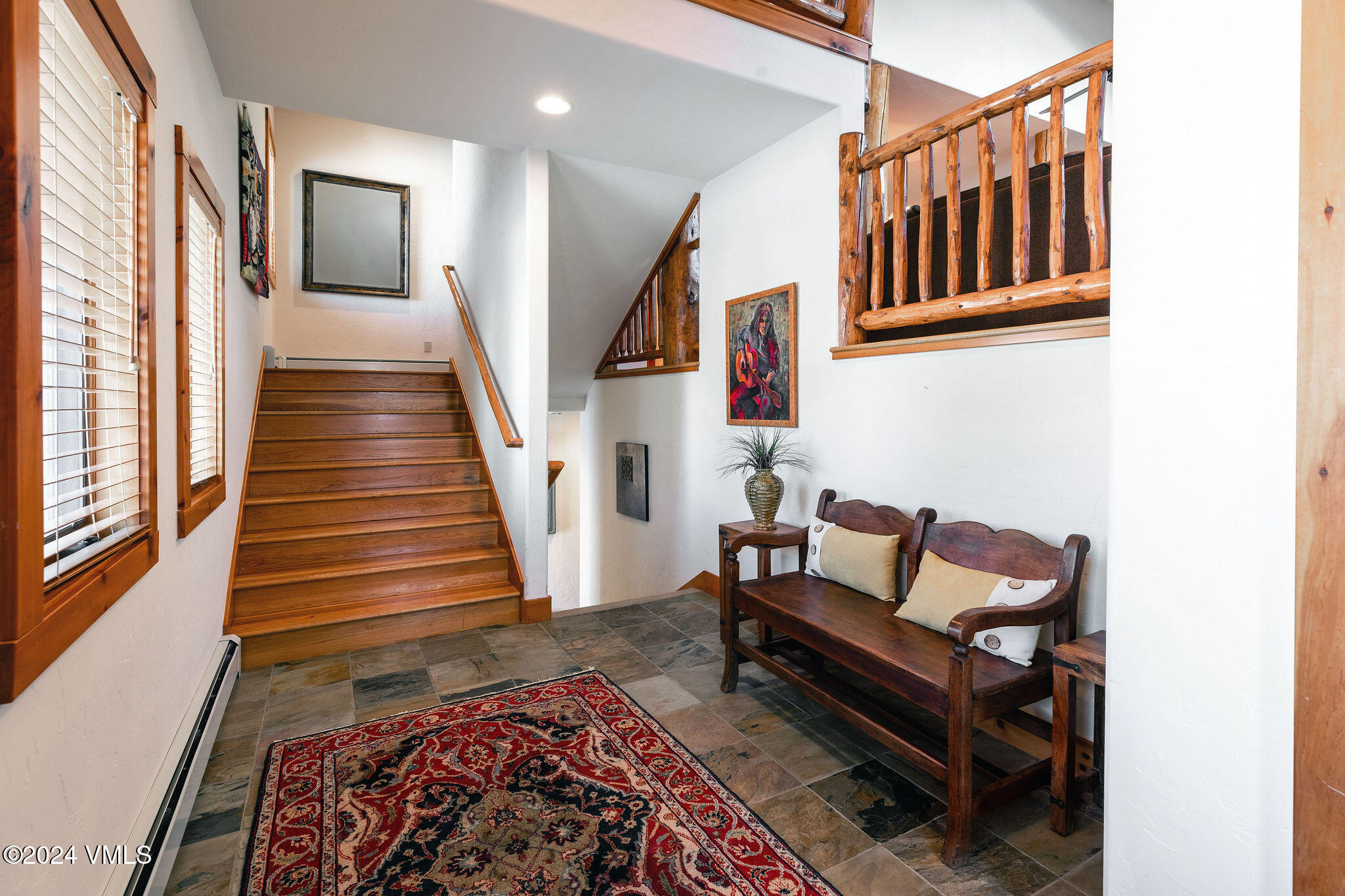 42 Knudson Ranch Road Edwards, CO 81632 - Photo 20 of 22 a living room with furniture and a rug