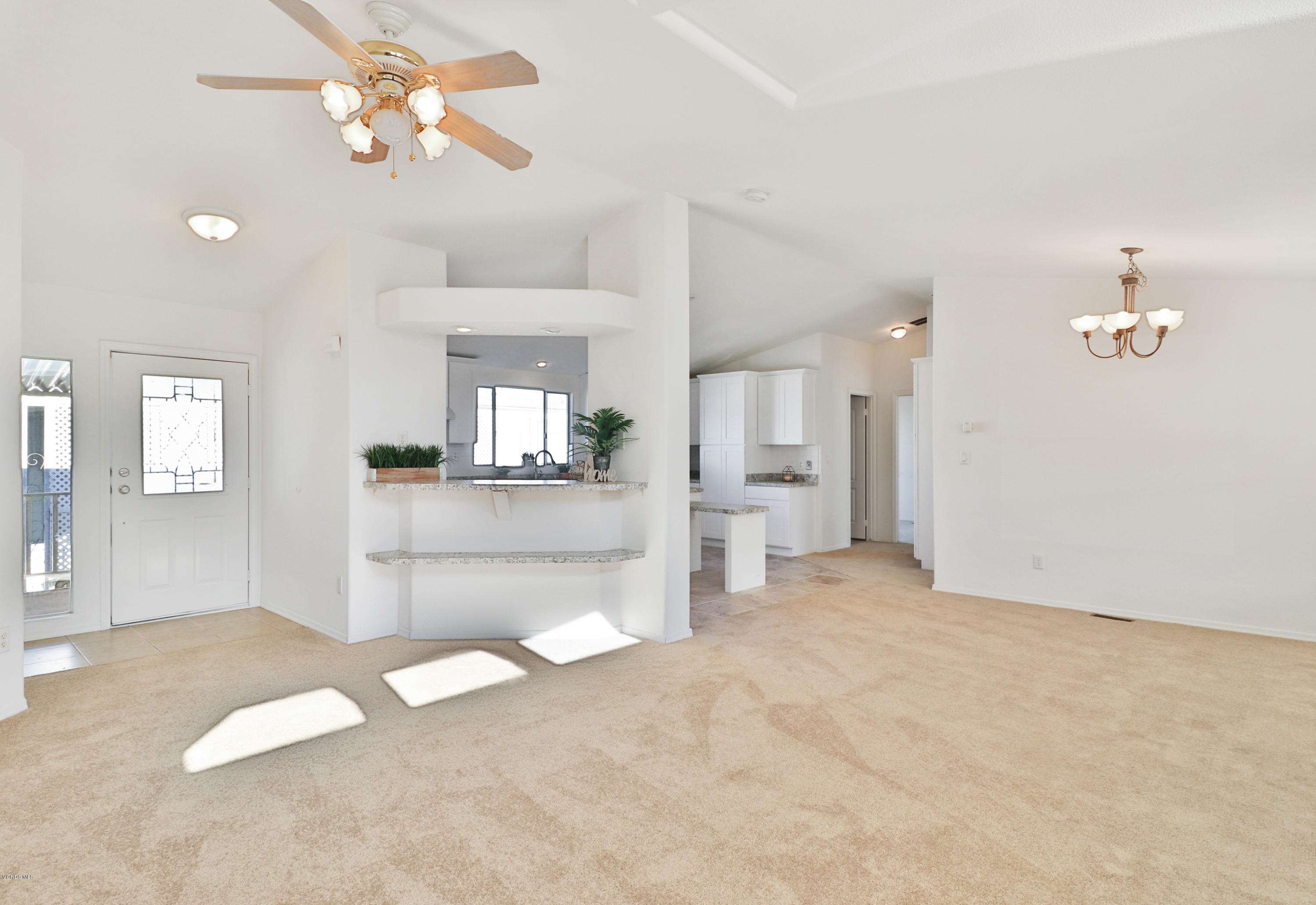 195 Tierra Rejada Road, Unit 215 Simi Valley, CA 93065 - Photo 8 of 32 Living toward Kitchen/ Dining