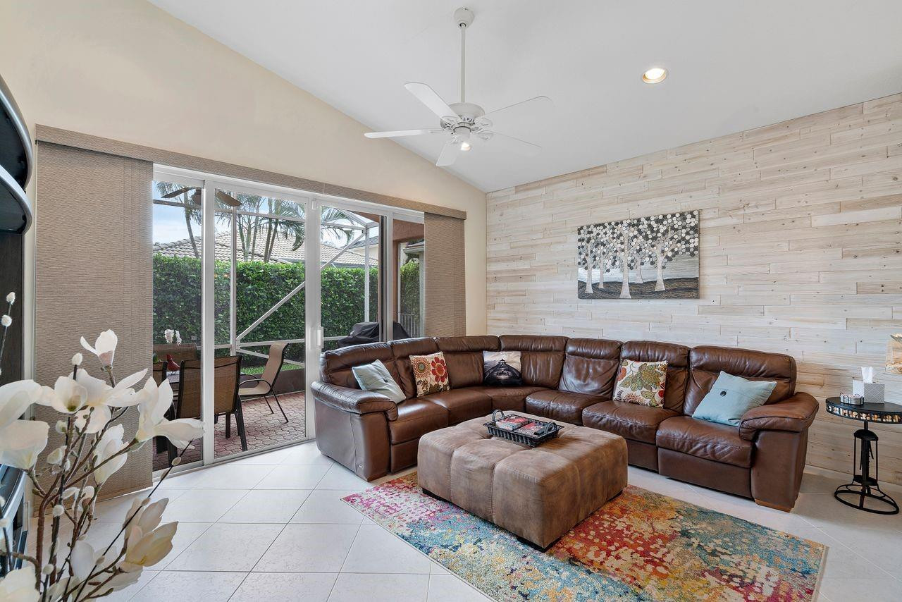 23302 Torre Circle Boca Raton, FL 33433 - Photo 10 of 39 Wood Feature Wall in Family Room