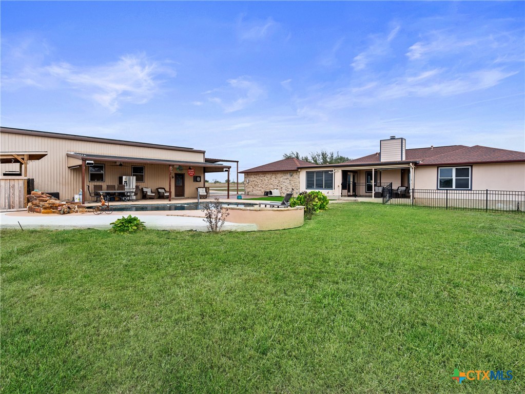 782 Santa Clara Loop Marion, TX 78124 - Photo 21 of 48 a view of a house with patio and a yard