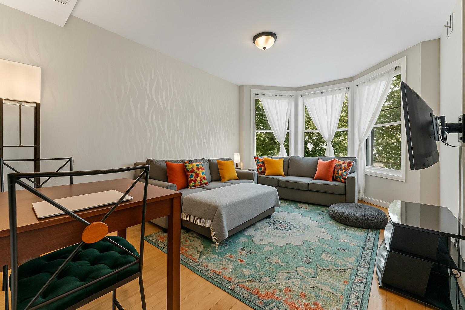 2703 North Ridgeway Avenue, Unit 2 Chicago, IL 60647 - Photo 2 of 9 a living room with furniture and a window