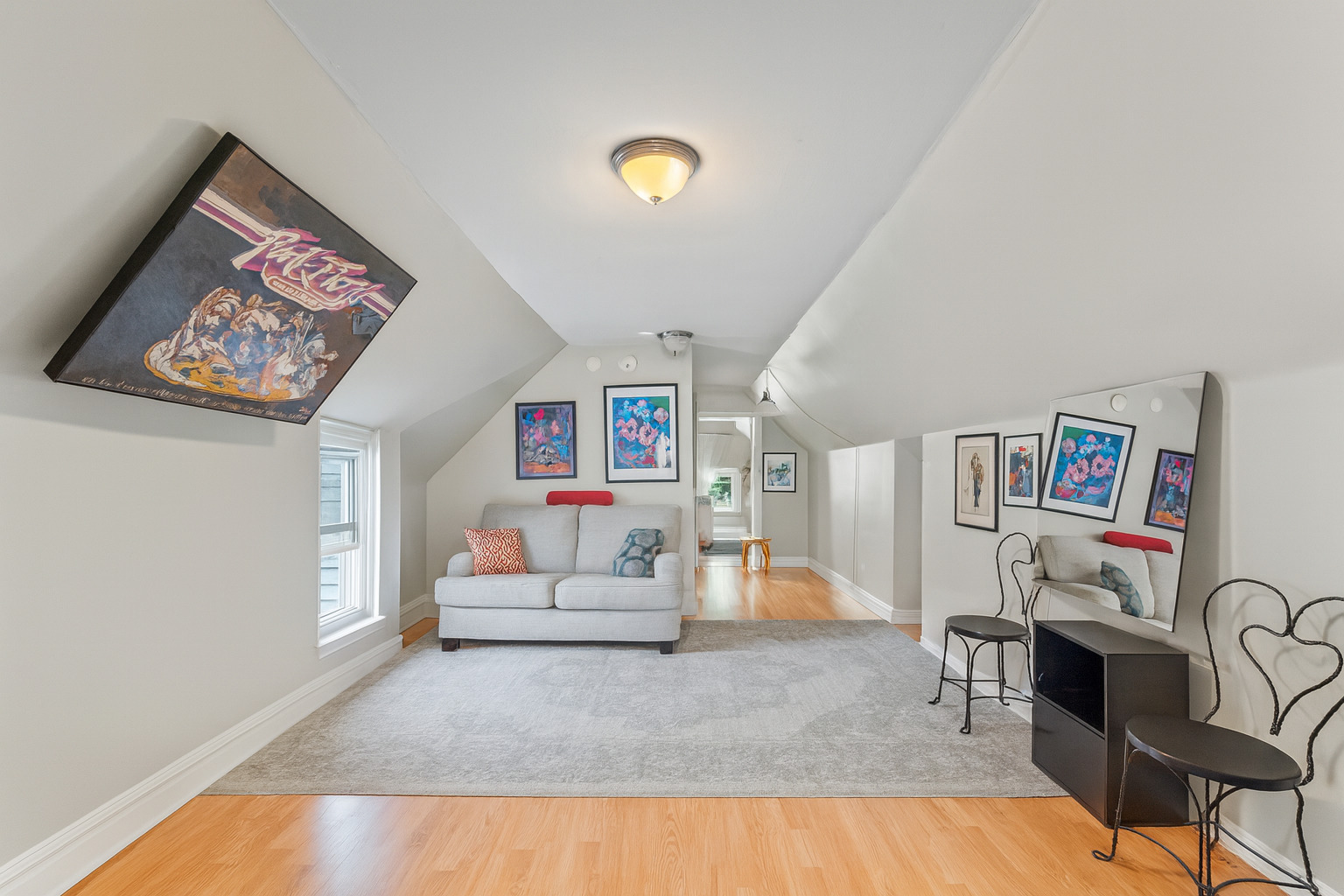 2703 North Ridgeway Avenue, Unit 2 Chicago, IL 60647 - Photo 6 of 9 a living room with furniture and a flat screen tv