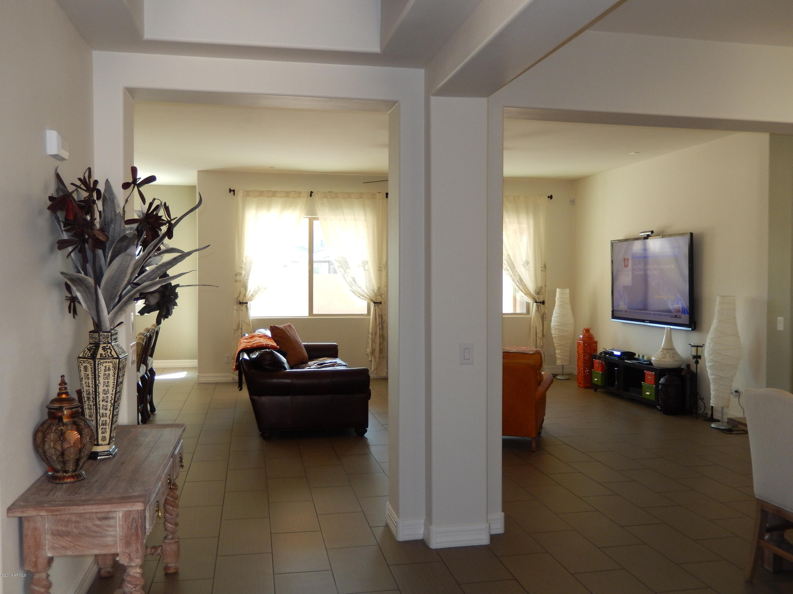 16079 West Coronado Road Goodyear, AZ 85395 - Photo 4 of 32 VIEW FROM ENTRY TO GREAT ROOM